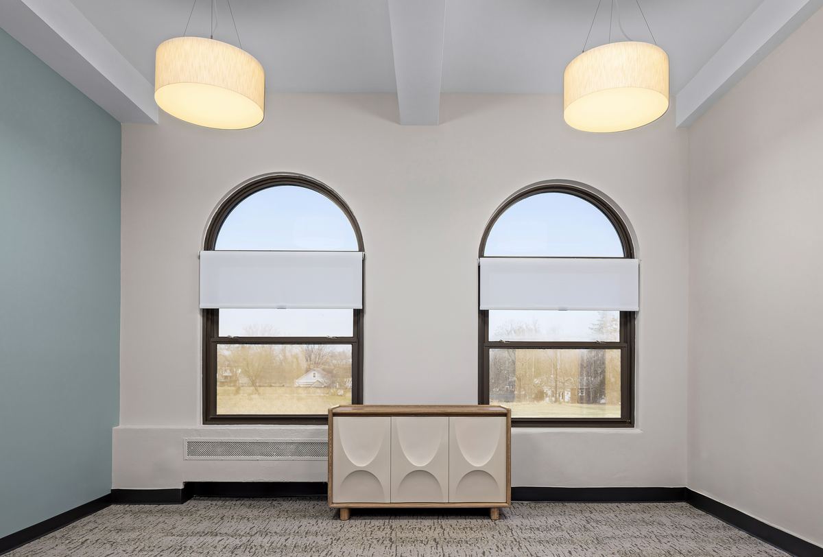 Room with paired arched windows and a pale blue wall, Appalachian Center for Hope