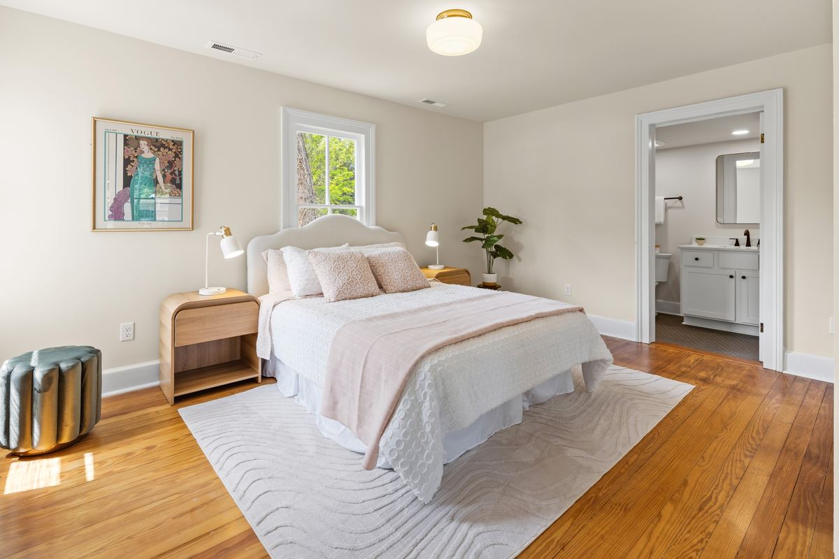 Bright bedroom with white bedding and an ensuite beyond, Staunton