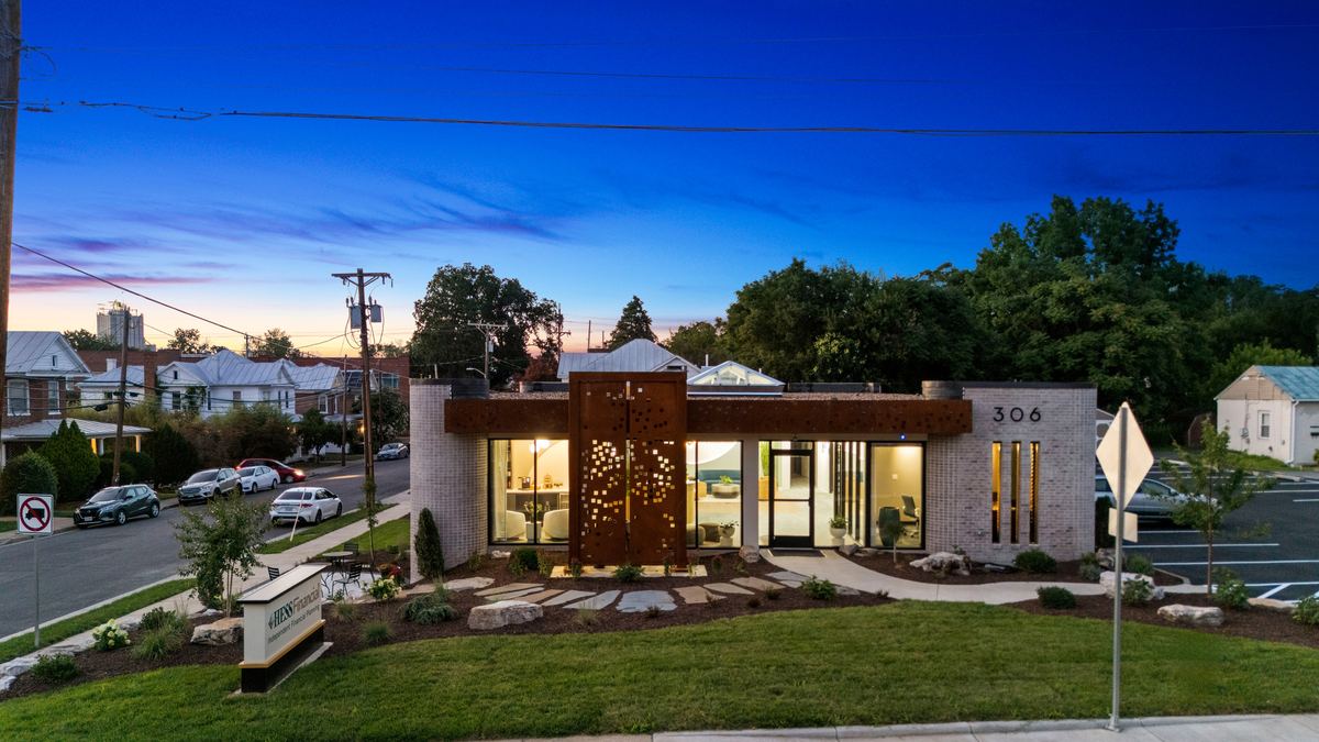 Hess Financial office at blue hour, corten screen and lit glazing, Harrisonburg