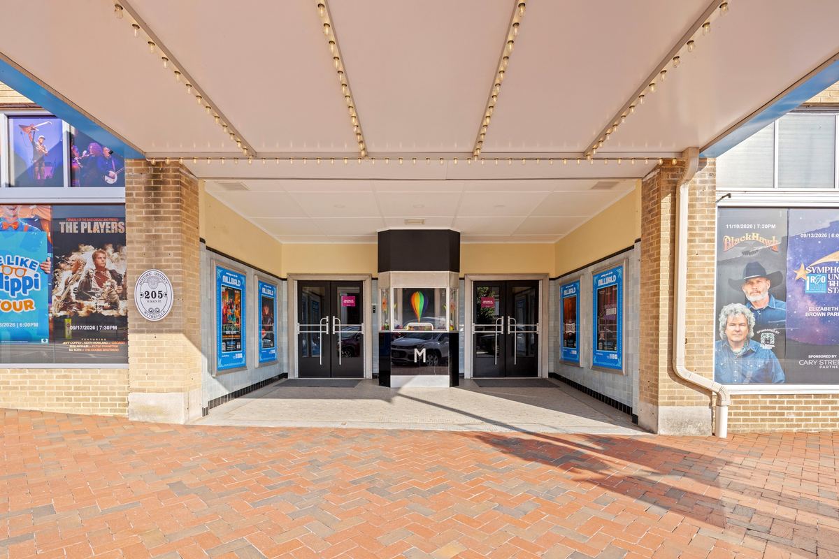 Outer lobby under the marquee, show posters either side