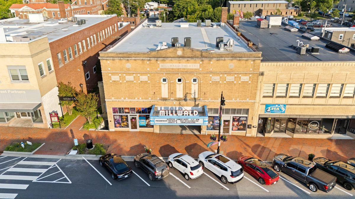 Aerial of the theatre and downtown Wytheville against the mountains